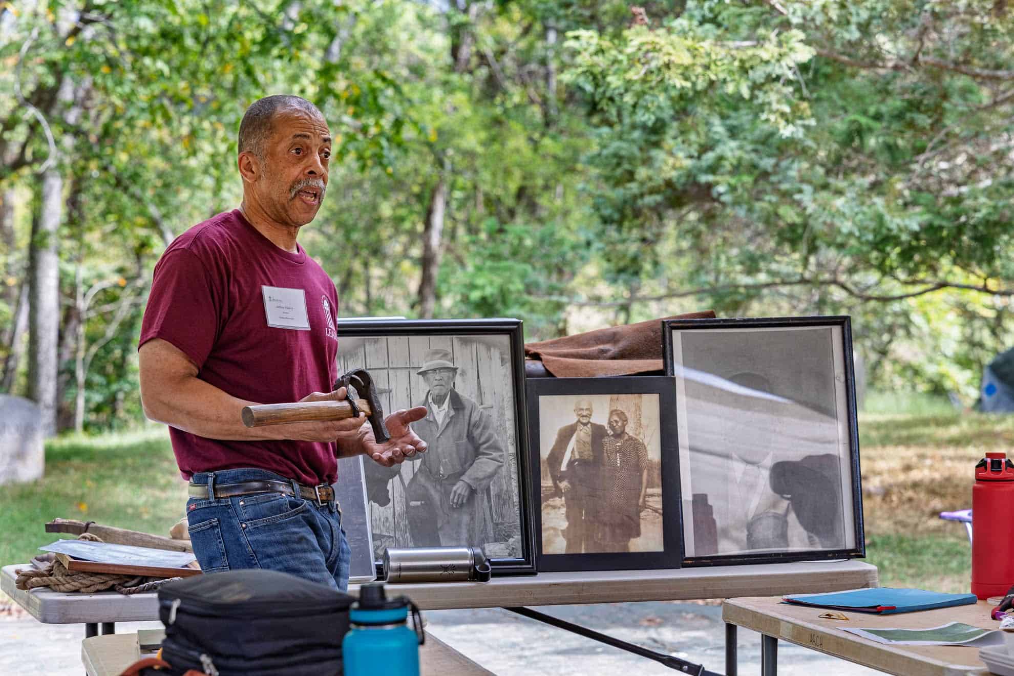 Jeffery Mabry discussig his family history of blacksmithing at the archaeology site.