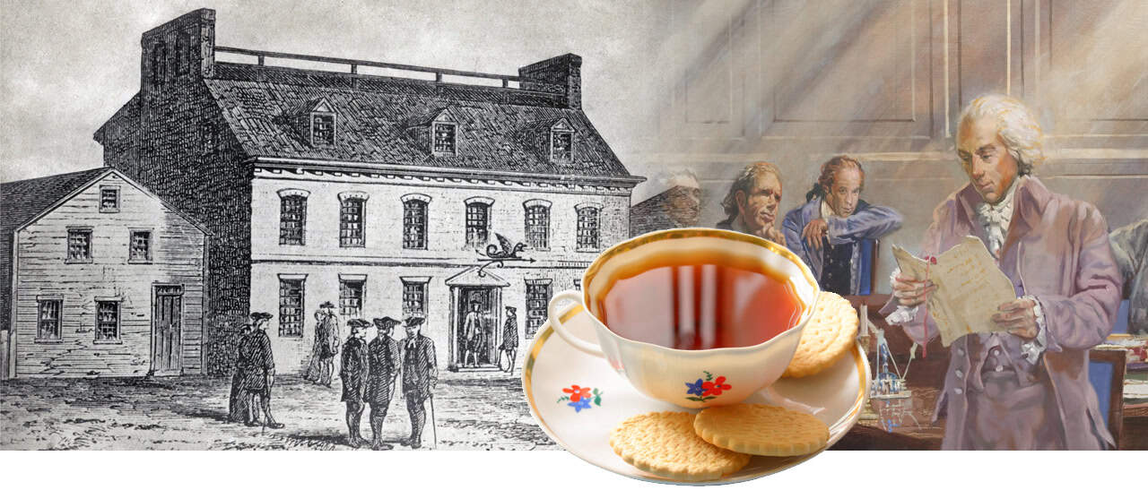 A teacup with biscuits is in the foreground; behind it are historical illustrations of people gathered outside a colonial building and men reading a document indoors.